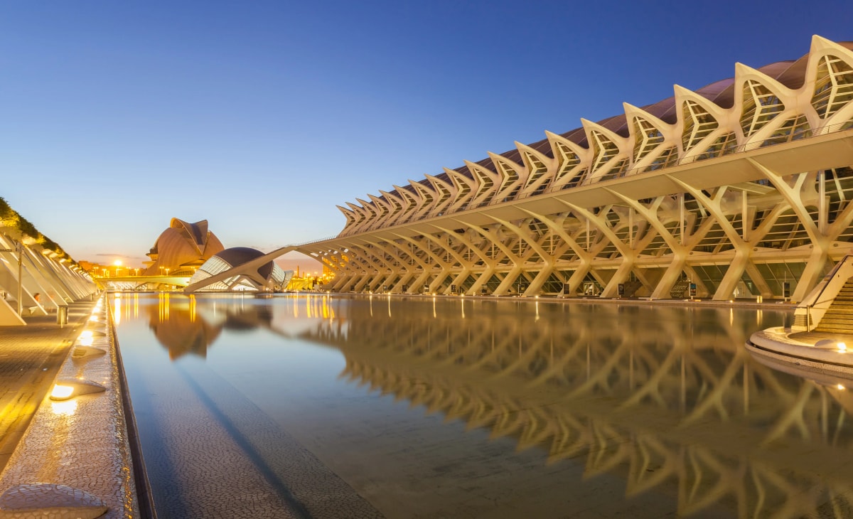 The Prince Philip Science Museum reflected in the pools at dusk, City of Arts and Sciences, Valencia, near the IRONMAN 70.3 finish